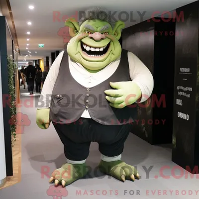 Productafbeelding van Ogre-mascottekostuumkarakter REDBROKOLY gekleed met een pakbroek en hoofdbanden