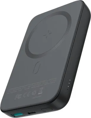 A dark gray wireless charging power bank is shown from a diagonal angle against a white background.