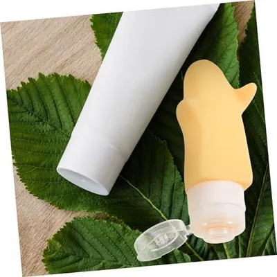 Produktbild von 4 nachfüllbare Quetschflaschen für Shampoo, Duschgel und Kosmetik – leichte, tragbare Reisebehälter