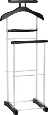 A black and white valet stand with a hanger, shelf, and trouser bar.