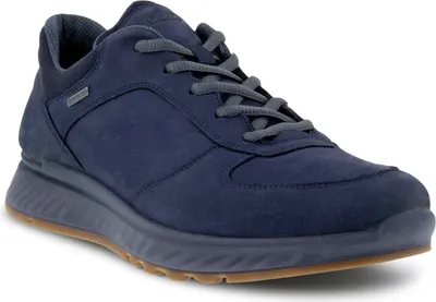 A single blue Ecco Exostride sneaker is shown from a side-angle against a white background.
