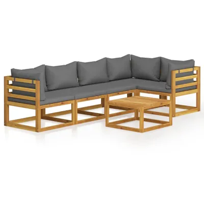 A sectional outdoor sofa set with cushions and a coffee table, displayed on a white background.
