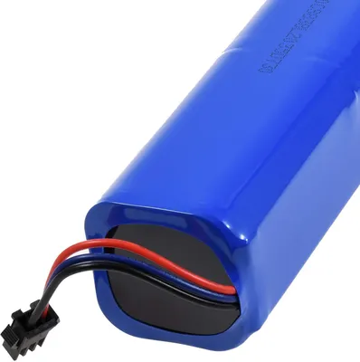 A close-up shot of a blue battery pack with red and black wires connected to a black connector.