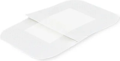 Two white wound dressings are shown on a white background.