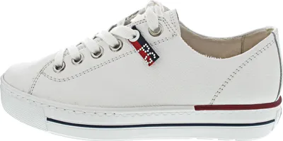 A side view of a white leather sneaker.