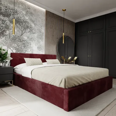 A bedroom with a large bed, nightstand, and wardrobe.