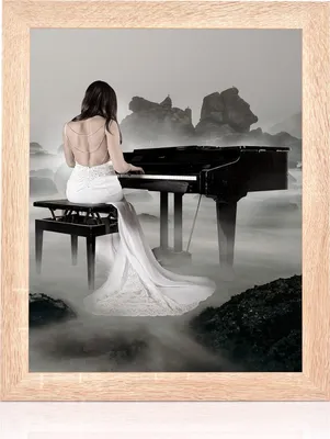 A woman in a white dress plays a piano in a misty, rocky landscape.
