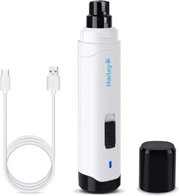 A white electric dog nail grinder with a black cap and a white USB charging cable are displayed against a white background.