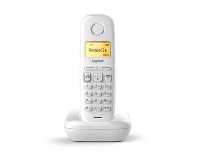 A white Gigaset cordless phone is shown on its charging base against a white background.