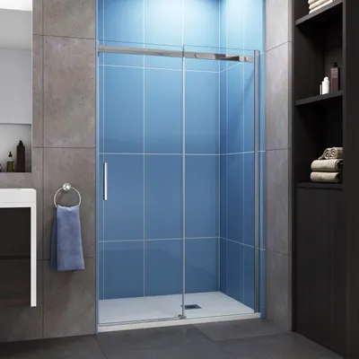 A modern bathroom with a glass shower enclosure.