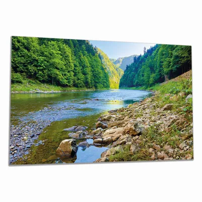 Produktbild von Wallario Herdabdeckplatte aus Glas, Größe 90 x 52 cm 1-teilig, Motiv Fluss in den Bergen an steinigem Ufer