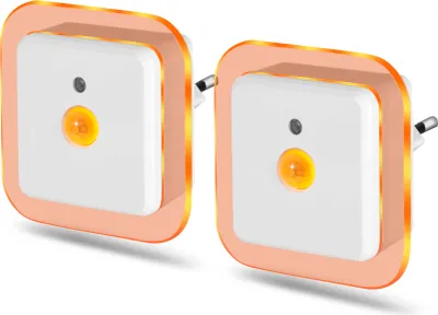 Two white square LED night lights with orange glowing borders, plugged into an unseen outlet.