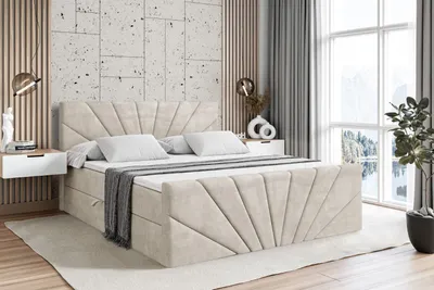 A bedroom scene featuring a taupe velvet boxspring bed with a headboard and footboard, two white nightstands, and a large window with a view of a winter landscape.