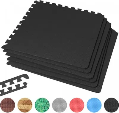 A stack of black interlocking foam mats with a few smaller pieces and color swatches at the bottom.