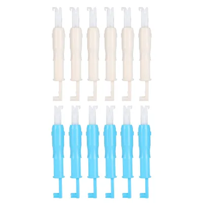 A top-down view of two rows of plastic sewing tools against a white background.