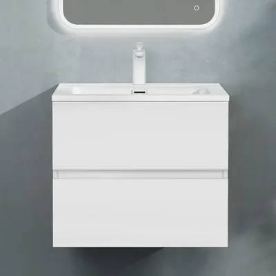 A white bathroom vanity with two drawers below a sink and faucet.