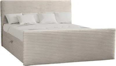 A bed with a headboard and mattress.