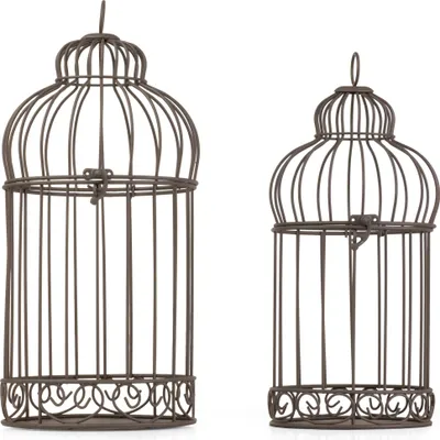 Zdjęcie produktu dla Zestaw 2 ozdobnych klatek dla ptaków z metalu w kolorze antycznej brązu w stylu vintage. Duża klatka o wymiarach 39,5 x 19 cm i mała o wymiarach 35 x 16 cm do postawienia lub zawieszenia.