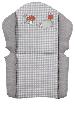 A baby high chair insert with a checkered pattern and embroidered animal and mushroom motifs.