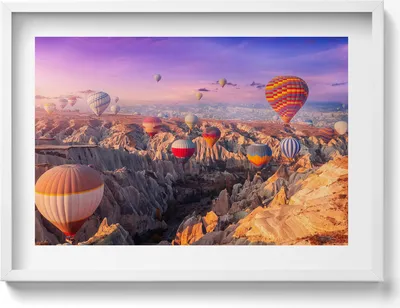 Produktbild von Ballons fliegen über eine Schlucht– Wandbild mit Rahmen – Gerahmtes Bild  – Wanddekoration – 70x50 cm –  Weiß Rahmen