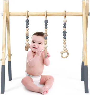 Produktbild von COSTWAY Detská telocvičňa Baby Play Hrazda Hrací oblúk Drevené centrum aktivít s 3 detskými hračkami pre rozvoj mozgu a senzorickú stimuláciu, pre deti od 3 mesiacov Ružová