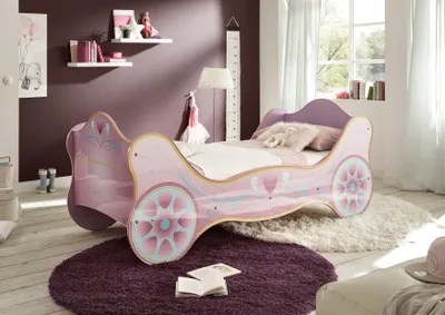 A child's bedroom with a princess carriage-themed bed.