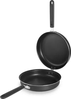 A black double frying pan is shown against a white background. The pan is open, with the top half hinged to the bottom half.