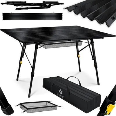 A black foldable camping table with its accessories, including a carrying bag and a mesh basket, displayed on a white background.