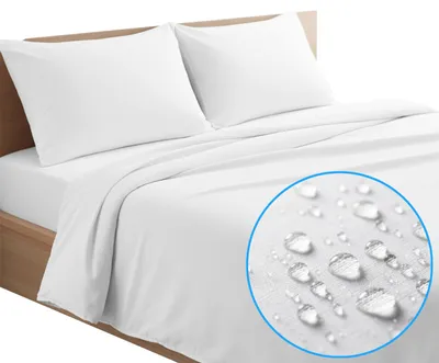 A white duvet cover or pillow protector is shown on a bed, with a close-up inset showing water droplets on the fabric.