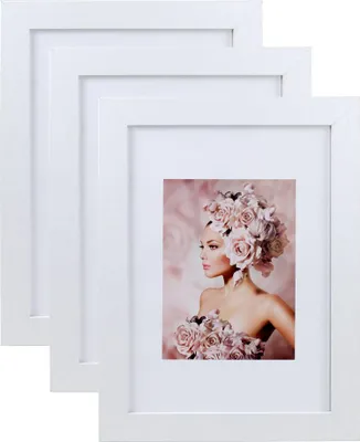 A stack of three white picture frames, with one frame displaying a portrait of a woman adorned with flowers.