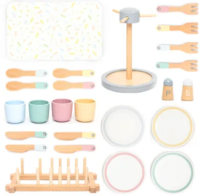 A collection of wooden toy dishes and utensils laid out on a white background.