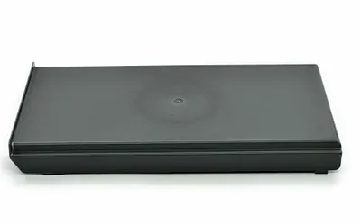 A dark gray lid for a trash can, shown from a side angle on a white background.