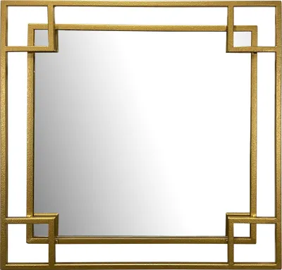 A square mirror with a gold geometric frame.