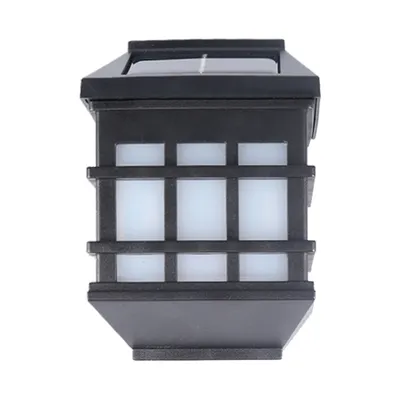 A black solar wall light with a grid-like translucent front, set against a white background.