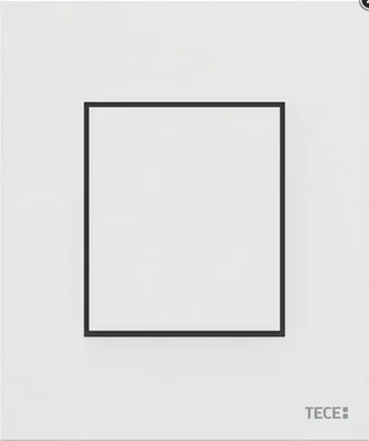 A white urinoir flush plate with a black border around the central area.