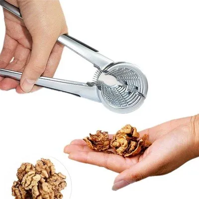 Produktbild von Gewichtige Nussknacker - Drehende Pecannussknacker - Anti-Rutsch-Griff - Geeignet für Walnüsse und Haselnüsse - Einzelstück