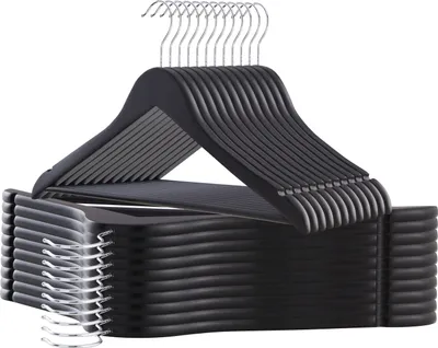 A stack of black wooden hangers with silver hooks, viewed from a slight angle.