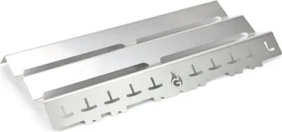 A stainless steel grill accessory with a patterned edge.