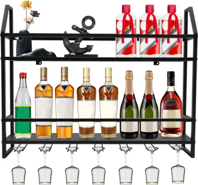 A black metal wine rack with two shelves, holding various bottles of wine and liquor, and wine glasses hanging from the bottom shelf.