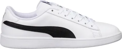 A side view of a white Puma sneaker with a black stripe.