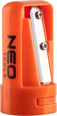 A close-up studio shot of an orange pencil sharpener.