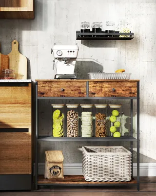 A kitchen counter with various kitchen items including an espresso machine, jars of food, a basket, and a wooden cabinet.