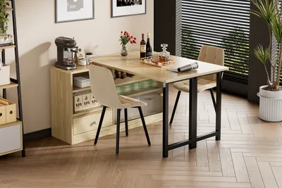 A dining set with a folding table and chairs next to a cabinet in a dining room.