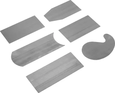 A set of six metal scraping tools arranged on a white background.