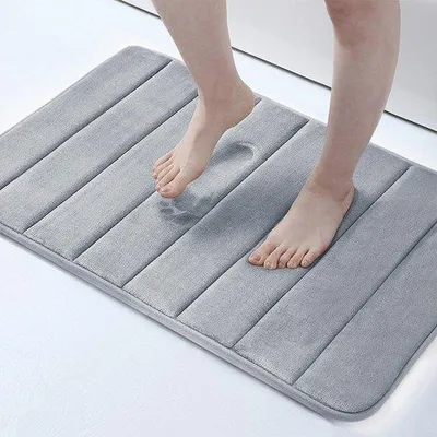 Produktbild von Unyqoos® Badematte 60 x 40 cm – grau, aus Memoryfoam, rutschfeste Unterseite, schnelltrocknend