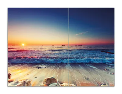 Produktbild von Wallario Herdabdeckplatte aus Glas, Größe 70 x 52 cm 2-teilig, Motiv Sonnenuntergang am Meer mit Wellen am Strand
