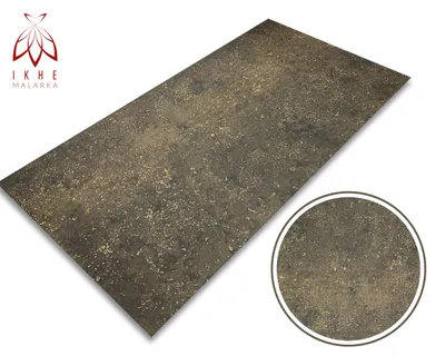 A rectangular panel with a concrete/marble imitation texture, shown diagonally. A circular inset shows a close-up of the texture. A logo and text are in the top-left corner.