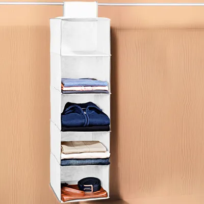 A hanging closet organizer with clothes and a belt.