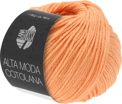 A ball of apricot-colored yarn on a light gray background.