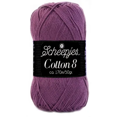 A ball of purple yarn with a black label.